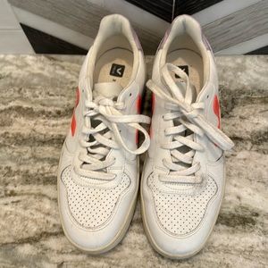 Veja x Madewell collaboration; white vegan leather sneakers w/neon orange V